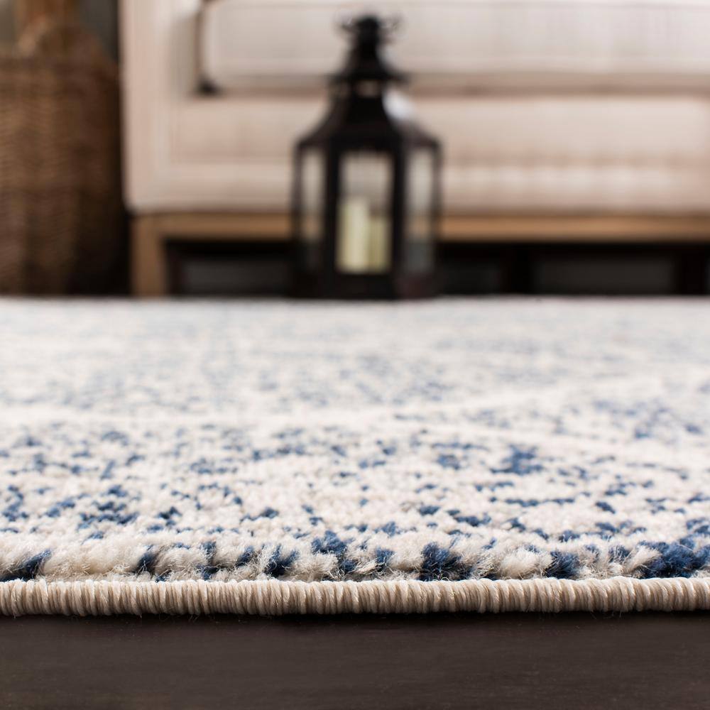 Reversible 10' x 14' Blue Synthetic Rectangular Area Rug