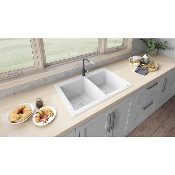 https://images.thdstatic.com/productImages/e82a8325-7873-4ced-be28-732fccd3003f/svn/arctic-white-ruvati-drop-in-kitchen-sinks-rvg1388wh-4f_600.jpg