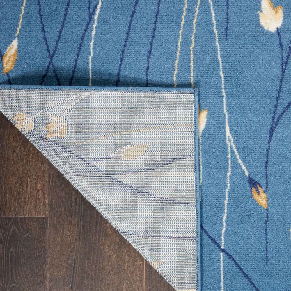 Light Blue Floral Synthetic 5' x 7' Area Rug