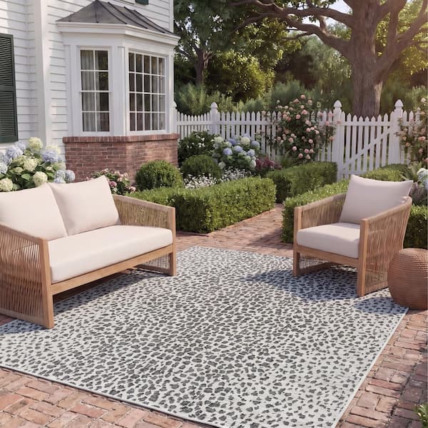 Courtyard 2 ft. x 4 ft. Ivory/Black Cheetah Geometric Indoor/Outdoor Area Rug