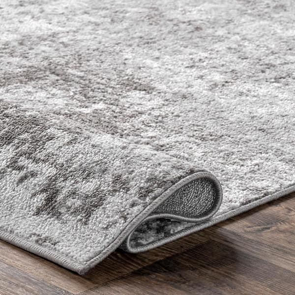 https://images.thdstatic.com/productImages/e83ec496-6791-4980-8212-878446c87f5d/svn/light-gray-nuloom-area-rugs-lpbl05a-8010-1f_600.jpg