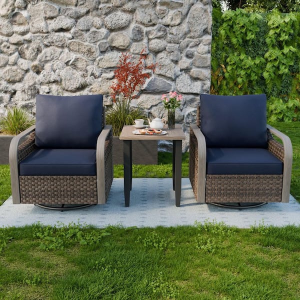 3-Piece Brown Wicker Outdoor Conversation Set Swivel Rocking Chairs with Blue Cushions and Wood Grain Top Side Table