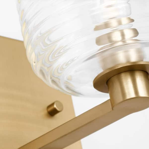 SCOTT LIVING - Lochdale Small 5.375 in. 1-Light Satin brass Sconce Vanity Light with Clear Ribbed Glass Shade