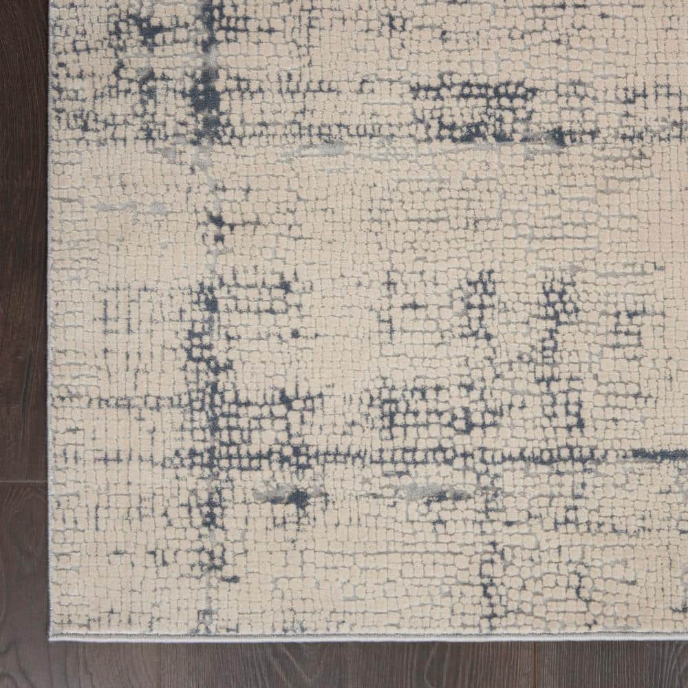 Modern Abstract Ivory & Blue Synthetic Area Rug 7'10" x 10'6"