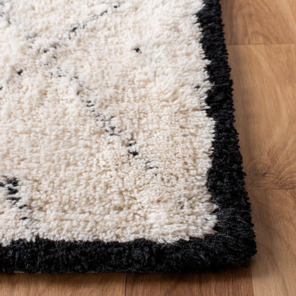 Ivory and Black Geometric Wool Shag Area Rug 3' x 5'