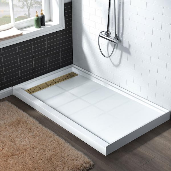 https://images.thdstatic.com/productImages/e87a1dcf-392e-4e19-8ad0-40e589b5b206/svn/white-with-brushed-gold-drain-cover-woodbridge-shower-pans-hsb4241-e1_600.jpg