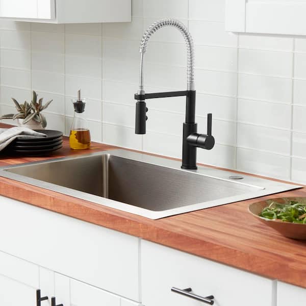 Statham Single-Handle Coil Spring Neck Pull-Down Sprayer Kitchen Faucet in Stainless Steel and Matte Black
