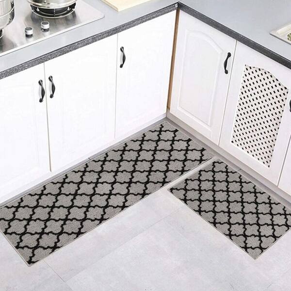 https://images.thdstatic.com/productImages/e889ecad-c4af-41af-aebb-904f9a1b44bb/svn/gray-black-kitchen-mats-l490041082set2-c3_600.jpg