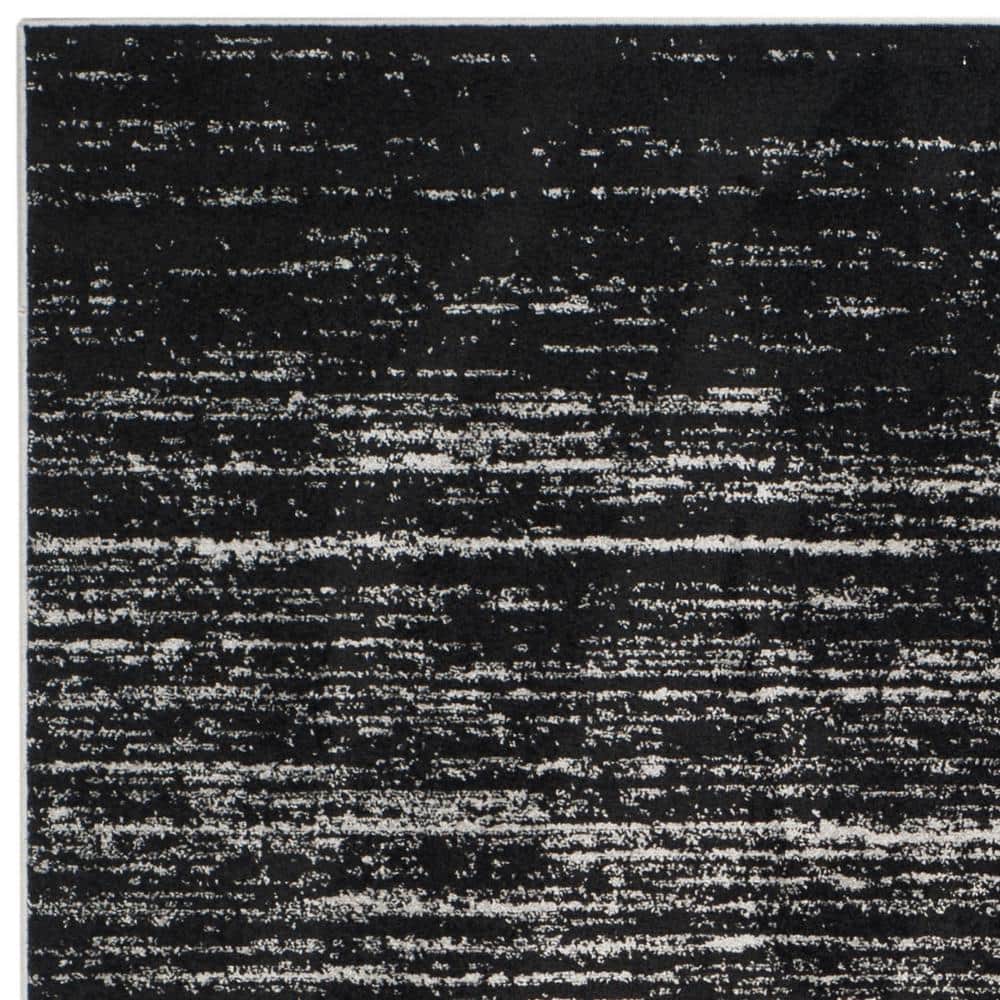Silver and Black Abstract Low Pile Area Rug, 9' x 12'
