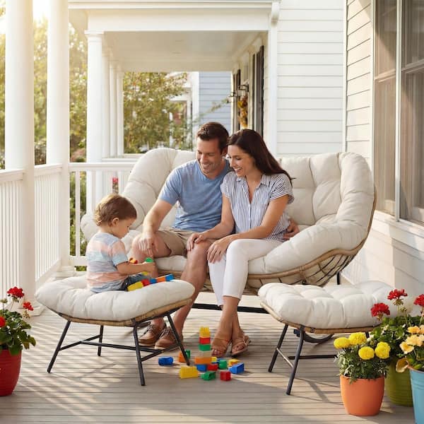 Wicker Outdoor Rocking Loveseat with Beige Cushions and Ottoman