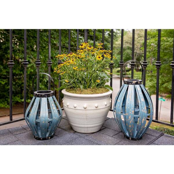 https://images.thdstatic.com/productImages/e8aea0d0-c706-4519-9e7f-a7f86cc030de/svn/matte-white-paddock-home-garden-plant-pots-527360-4f_600.jpg