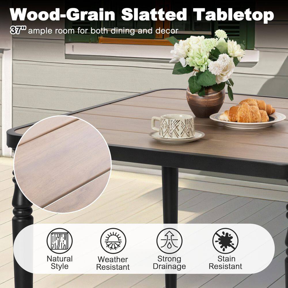 Close-up of the wood-grain slated tabletop of the dining table.