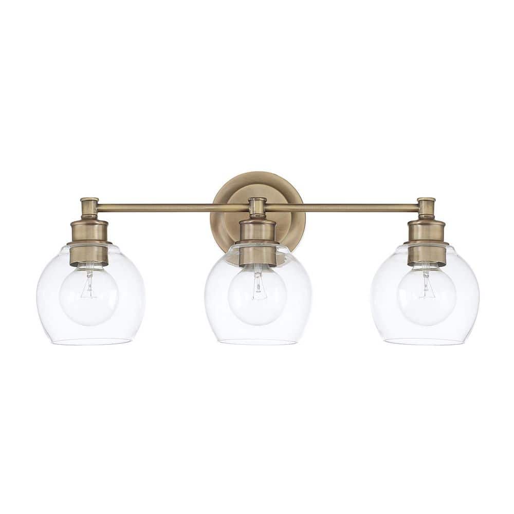 Mid Century 23.5 in. W x 10 in. H x 7 in. E 3-Light Aged Brass Vanity Light with Clear Glass price history on PriceWatchPro