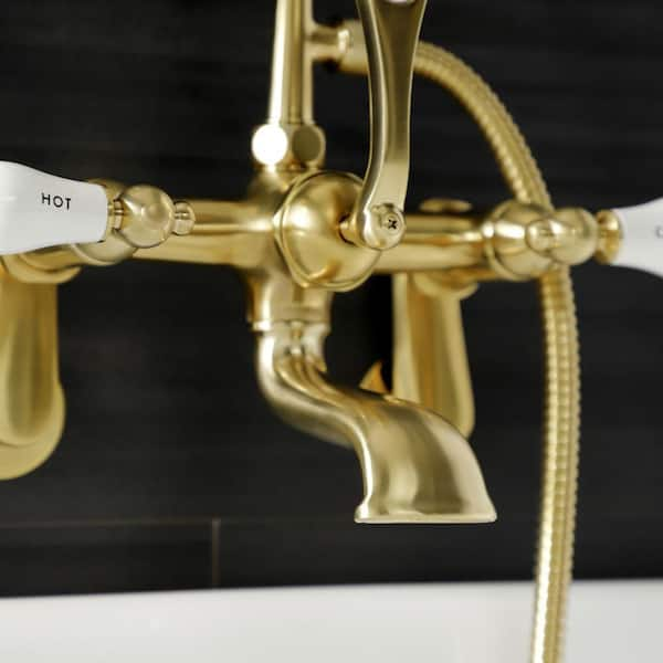 https://images.thdstatic.com/productImages/e8d24e65-6b95-4a7a-b64b-3affce122cdc/svn/brushed-brass-kingston-brass-claw-foot-tub-faucets-hae53t7-44_600.jpg