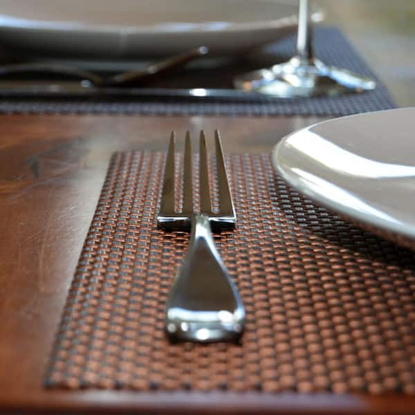 https://images.thdstatic.com/productImages/e8e1fe45-d591-4983-b79a-87de6388d43b/svn/browns-tans-kraftware-placemats-43847-4f_600.jpg