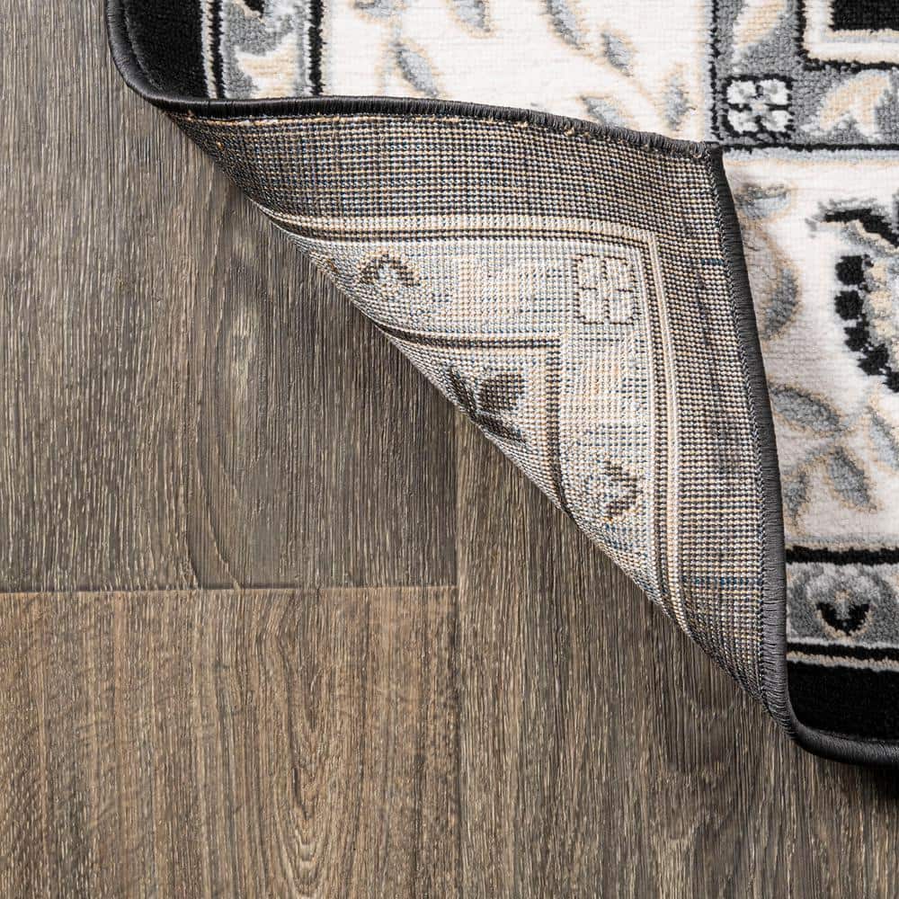 Elegant Persian-Inspired 4' x 6' Black and Cream Synthetic Rug