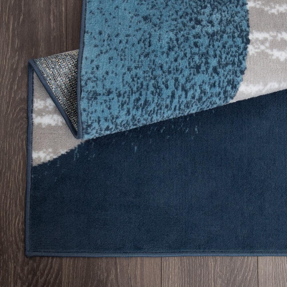 Gray and Blue Geometric 8' x 10' Synthetic Area Rug