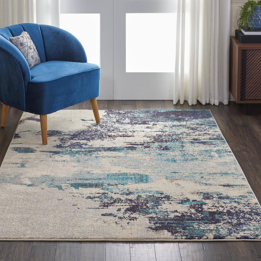 Abstract Blue and White Synthetic 5' x 7' Stain-Resistant Rug