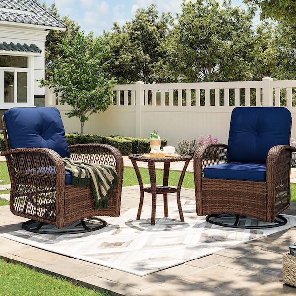 3-Piece Brown Wicker Patio Swivel Outdoor Rocking Chair Set with Blue Cushions and Table