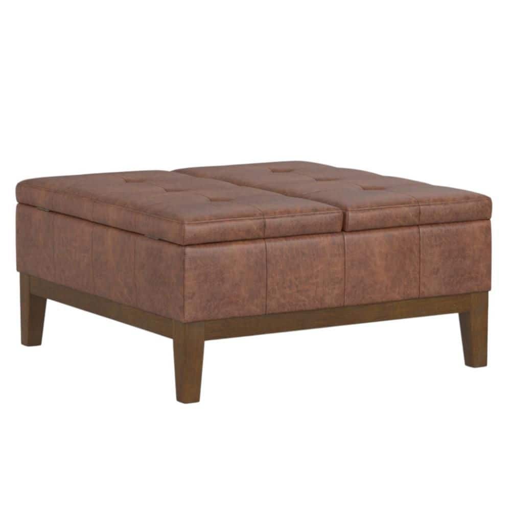 Brown faux leather square ottoman full view on white background.