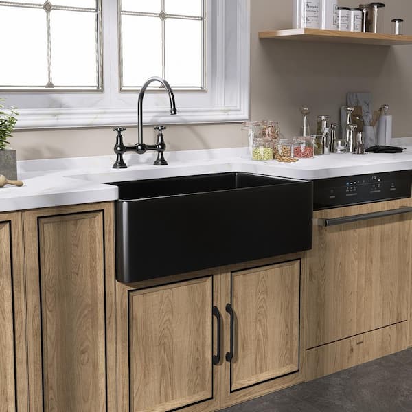 https://images.thdstatic.com/productImages/e92f4f5a-08d7-436c-a18a-51ef45ef9210/svn/matte-black-zeafive-farmhouse-kitchen-sinks-zfc3318-b2-c3_600.jpg