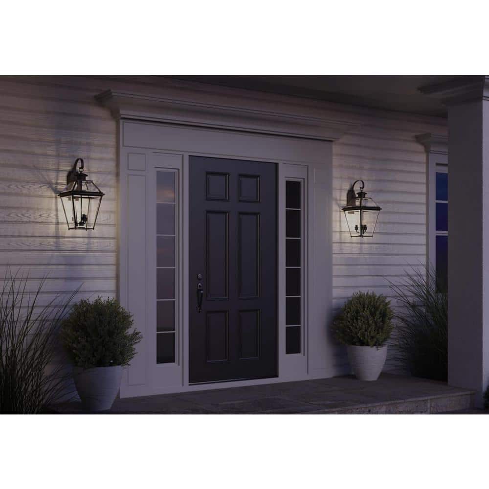 Elegant Antique Bronze Outdoor Wall Lantern with Beveled Glass