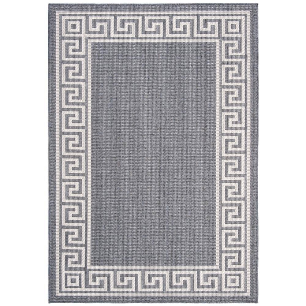 Dark Blue and Ivory Geometric 9' x 12' Synthetic Area Rug