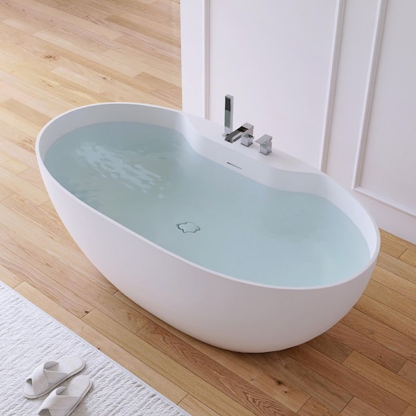 63 in. x 31.5 in. Stone Resin Solid Surface Matte Flatbottom Freestanding Soaking Bathtub in White with Faucets