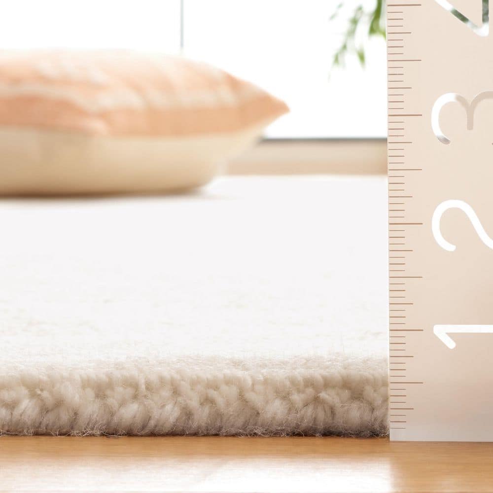 Mirage 8 ft. x 10 ft. Ivory Modern Solid Area Rug - thumbnail 4