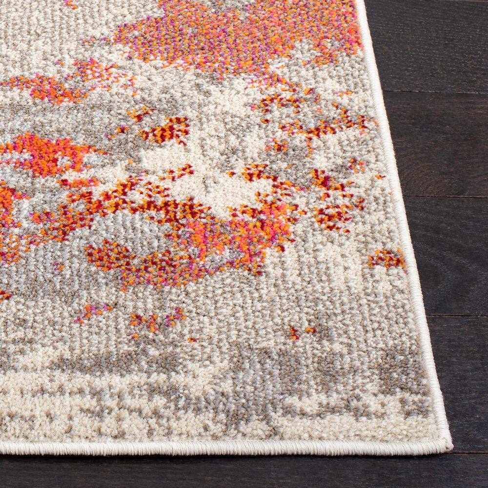 Gray and Orange Abstract 4' x 6' Synthetic Area Rug
