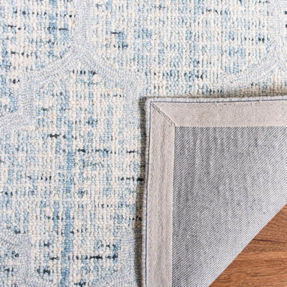Ivory and Turquoise Abstract Hand-Tufted Wool Area Rug, 2' x 3'