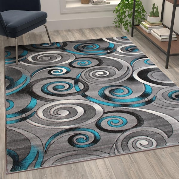 https://images.thdstatic.com/productImages/e994e738-f480-4a23-aaf4-ea1c1f59da81/svn/turquoise-carnegy-avenue-area-rugs-cga-acd-501059-tu-hd-31_600.jpg