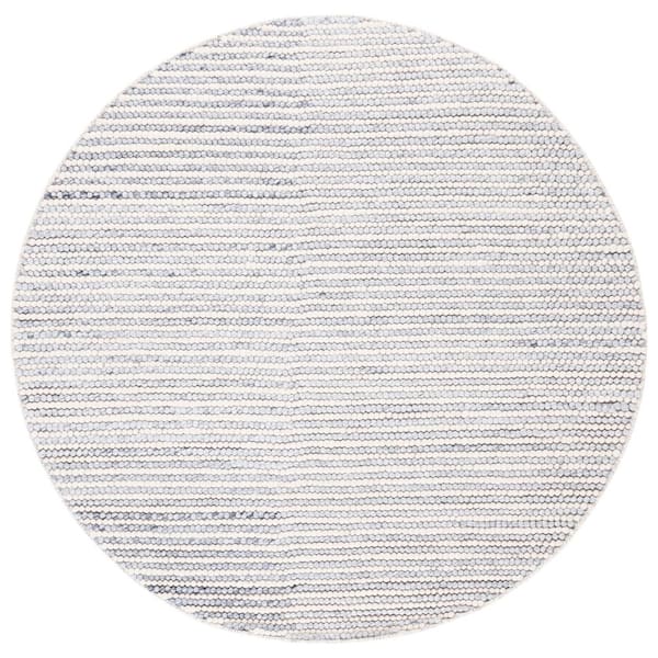 Natura 6 ft. x 6 ft. Ivory/Blue Solid Color Round Rug