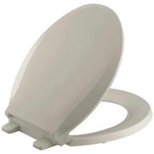 Cachet Quiet-Close Round Closed Front Toilet Seat with Grip-Tight Bumpers in Sandbar