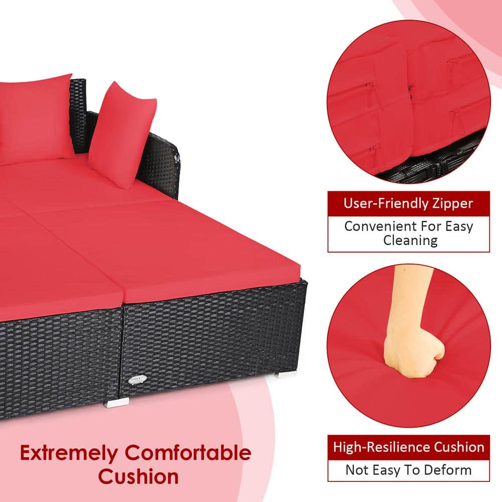 Outdoor Black Rattan Daybed with Red Cushions and Pillows