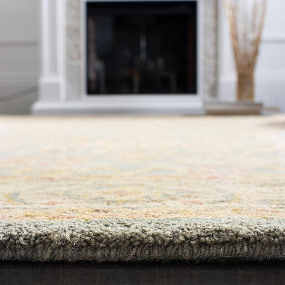 Handmade Blue and Ivory Tufted Wool Area Rug