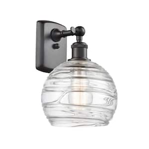 Athens Deco Swirl 1-Light Oil Rubbed Bronze Wall Sconce with Clear Deco Swirl Glass Shade
