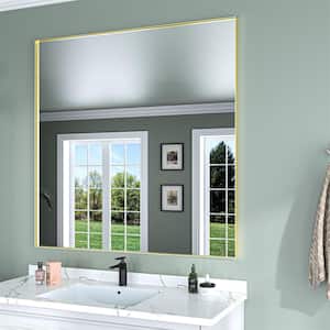48 in. W x 36 in. H Gold Aluminum Rectangle Framed Tempered Glass Wall-mounted Mirror