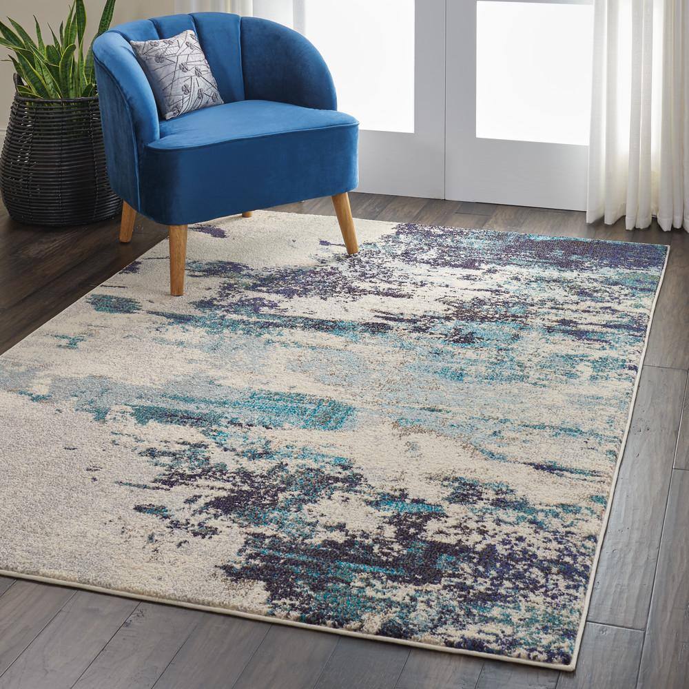 Abstract Blue and White Synthetic 5' x 7' Stain-Resistant Rug
