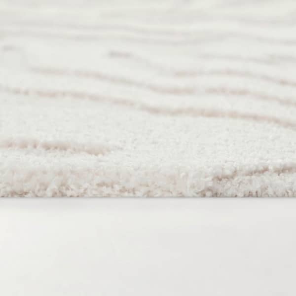 Wyon Cream 5 ft. 3 in. x 7 ft. Abstract Area Rug