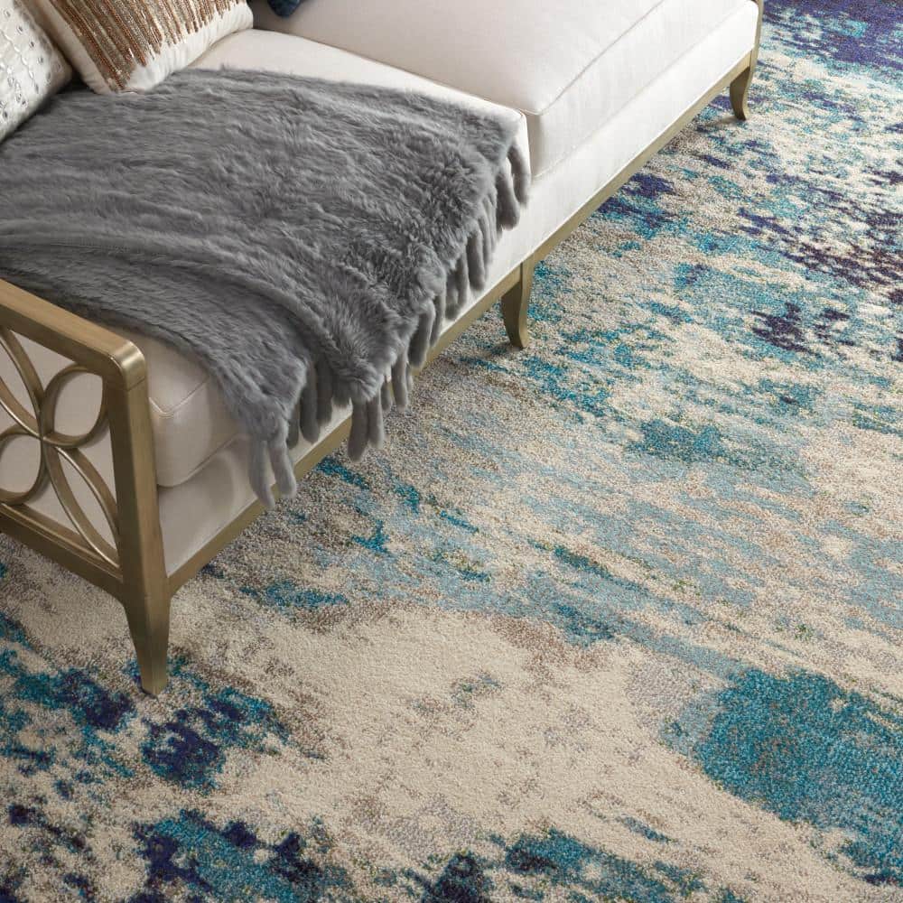 Celestial Swirl 9' x 12' Ivory & Teal Blue Abstract Synthetic Rug