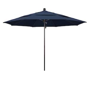 11 ft. Bronze Aluminum Commercial Market Patio Umbrella with Fiberglass Rib and Pulley Lift in Spectrum Indigo Sunbrella
