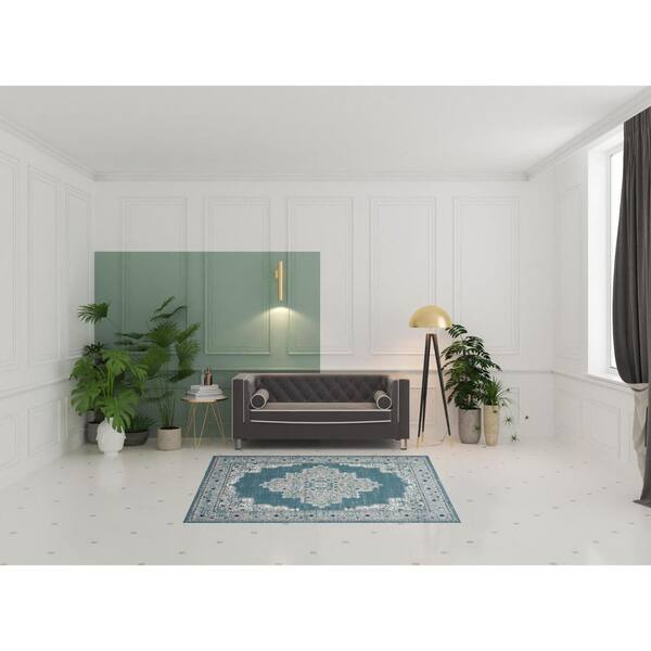 5' X 7' Aqua Floral Power Loom Distressed Area Rug