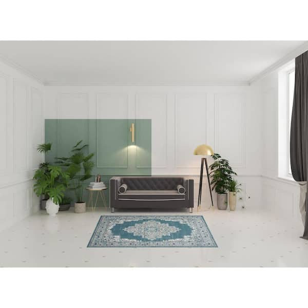 5' X 7' Aqua Floral Power Loom Distressed Area Rug