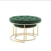 Two green velvet nesting ottomans nested together.