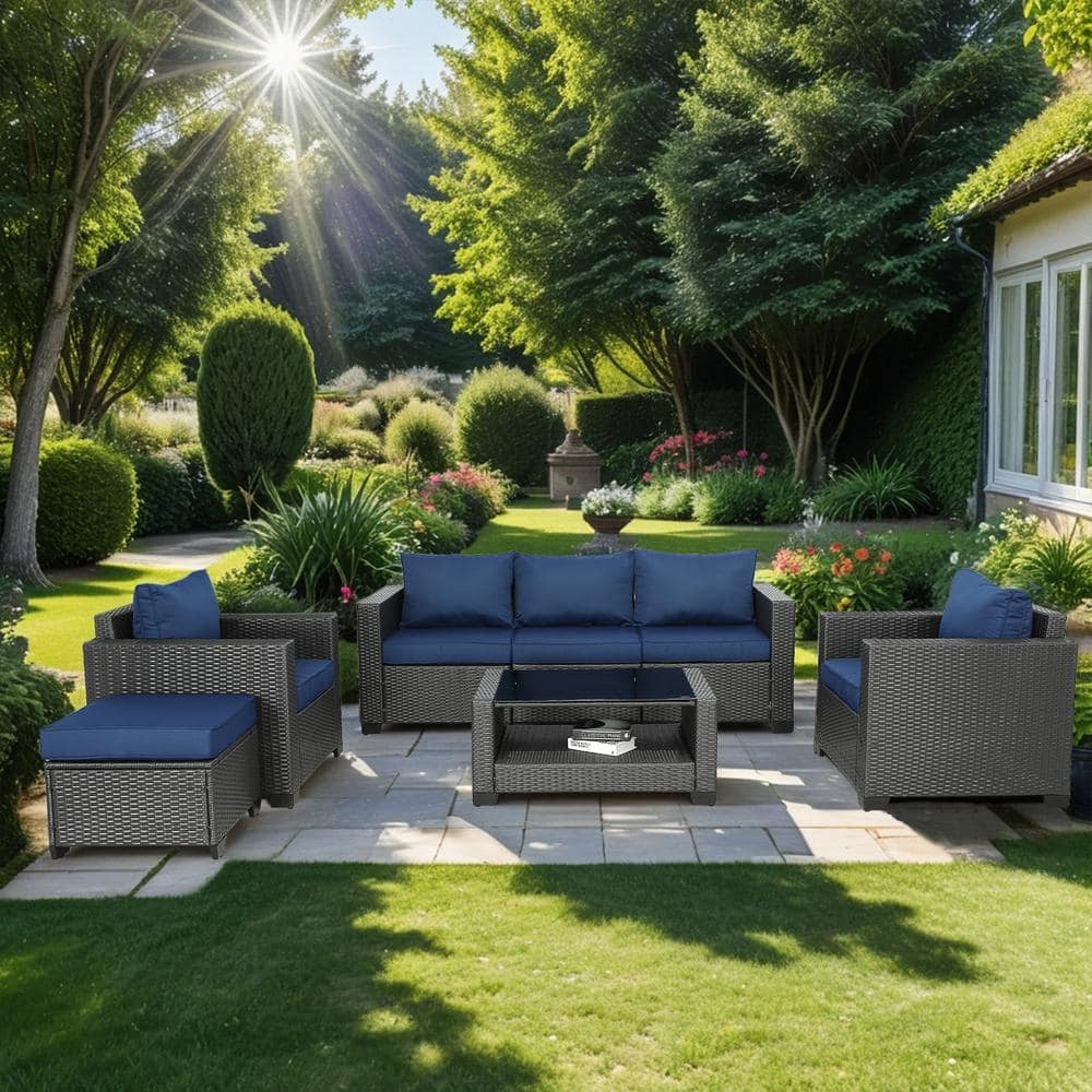 Black 7-Piece Wicker Outdoor Sectional Set with Dark Blue Cushions and Tabl