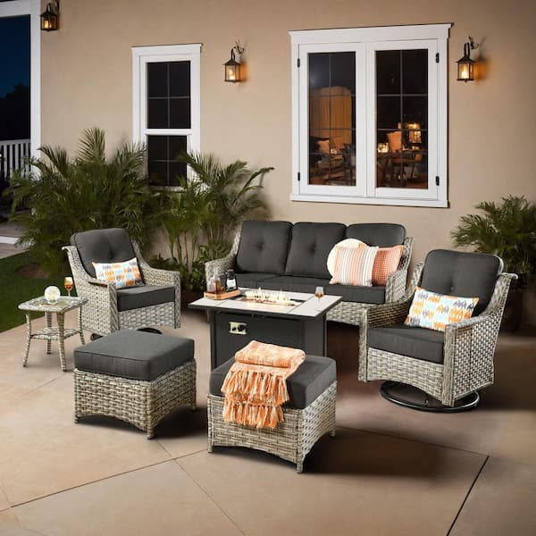 XIZZI Cristiano 7-Piece Wicker Patio Rectangular Fire Pit Set with  Black Cushions and Swivel Rocking Chairs