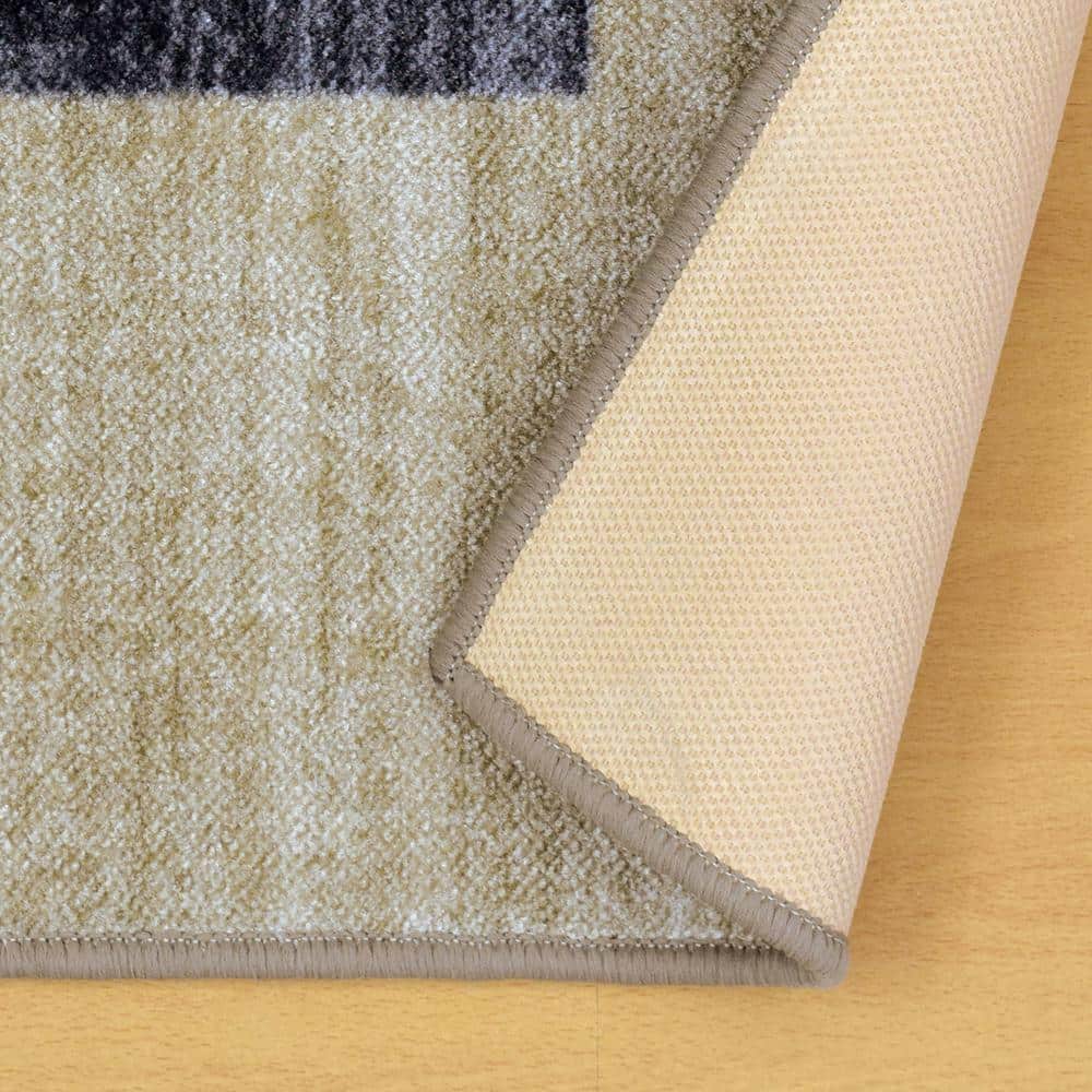 Cream 9' x 12' Non-Slip Synthetic Area Rug