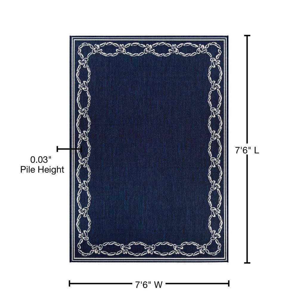 Ivory and Indigo Round Synthetic Indoor/Outdoor Area Rug