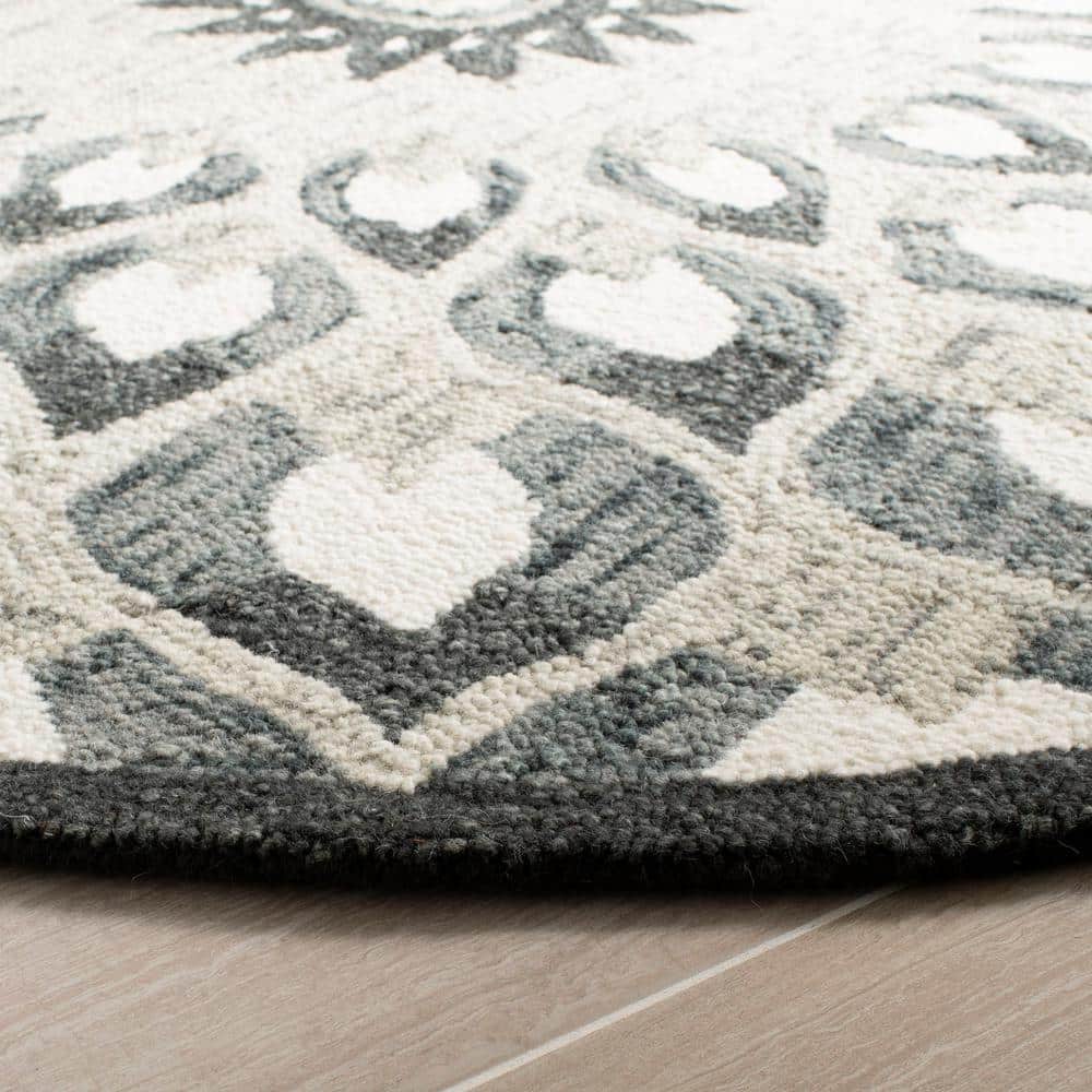 Handmade Charcoal and Ivory Wool 6' Round Tufted Area Rug